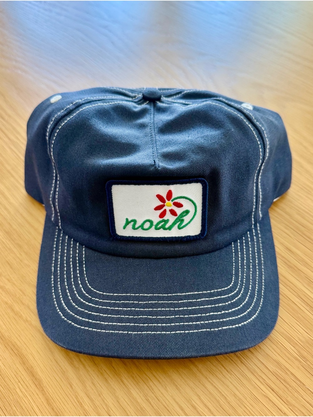 Noah NYC Navy Blue Cap with Flower Logo